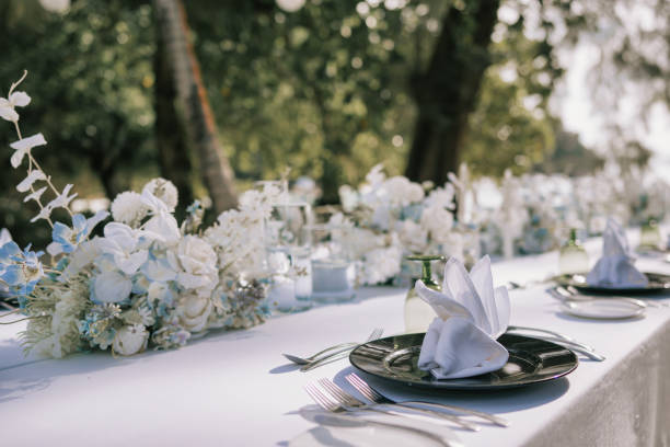 istock close up Table setting for outdoor event party or wedding reception 1650898330