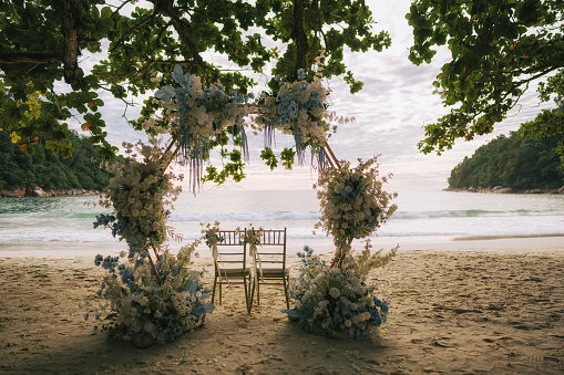 Beautiful wedding ceremony on the beach. Tropical exotic destination wedding concept
