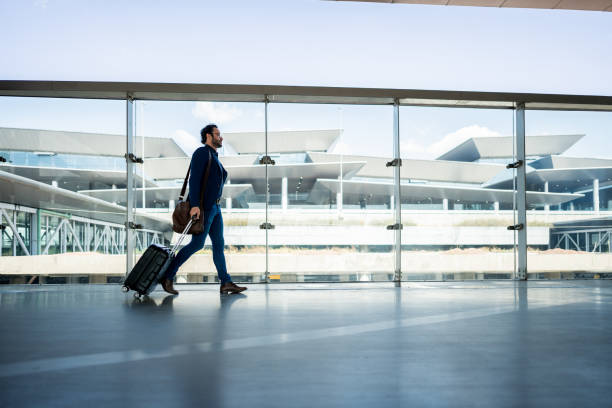 istock Businessman walking at the airport 1650906335