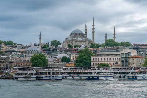 Istanbul, Turkey – June 29, 2023: Magnificent landscape city view of the Rustem Pasha Mosque and Eminonu Pier Kadikoy in Fatih district, Istanbul, Turkey.