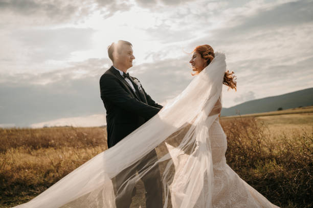 istock Happy newlyweds dancing in nature 1650971926