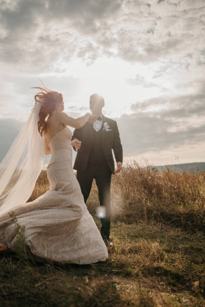 istock Happy newlyweds dancing in nature 1650982166