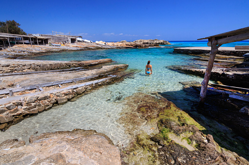 Es calo de Sant Agusti is an emblematic place of balearic island of Formentera. In this beach the fishermen park their fishing boats on wooden piers