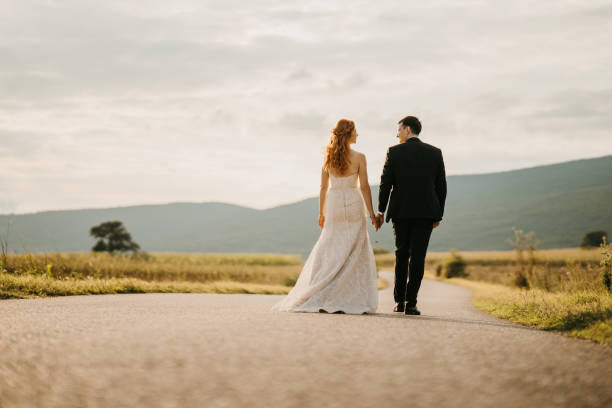 istock Hand in hand among summer beauty 1650985465