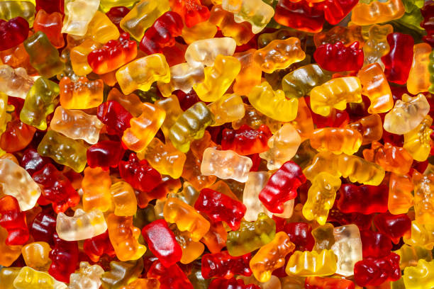 Gummy bears Gummy bears candy jellybean variation color image stock pictures, royalty-free photos & images