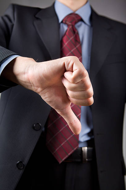 istock Businessman showing thumbs down 165101424