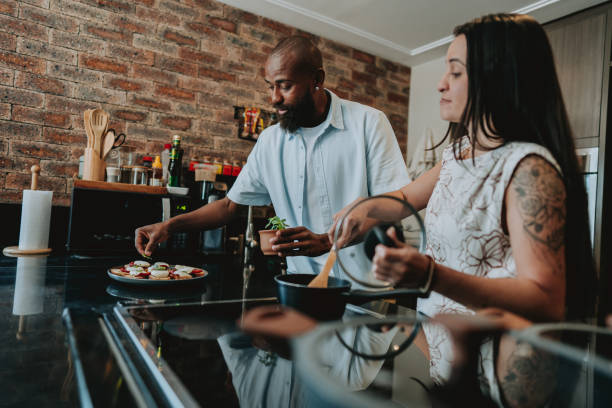 istock Couple cooking together 1651027514