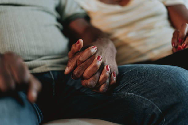 istock Senior holding hands detail 1651033484