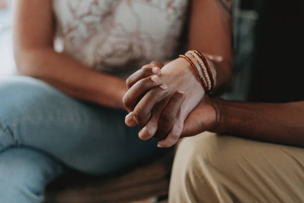 istock Couple holding hands detail 1651033523