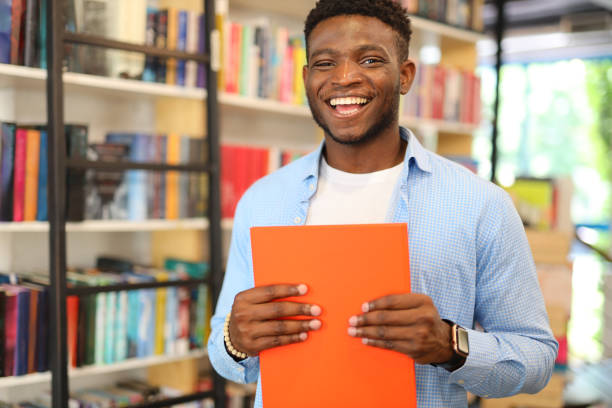 istock A content student in a library, immersed in education, among books and academic surroundings. 1651038340