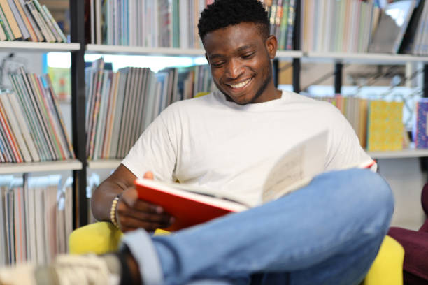 istock A dedicated young student in a library, engrossed in learning and surrounded by books. 1651038916