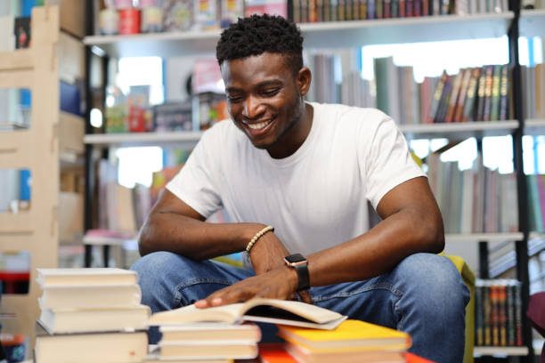 istock A focused student in a library, dedicated to education, surrounded by books and knowledge resources. 1651038924