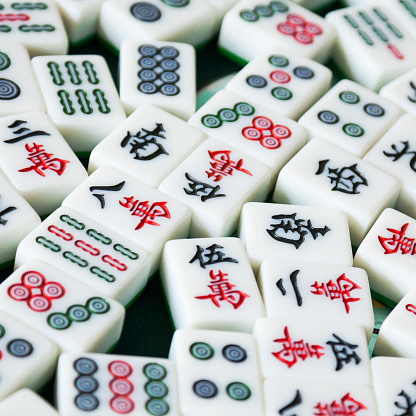 mahjong on table ancient asian board game close up image