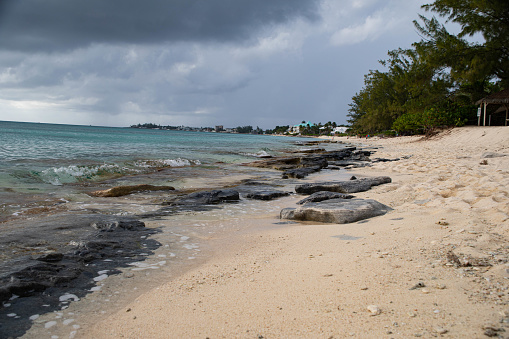 Strom clouds rolling in along the beach on Grand Cayman Island.