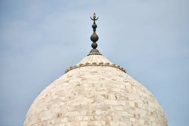 Photo of Close up Taj Mahal dome white marble mausoleum landmark in Agra, Uttar Pradesh, India,