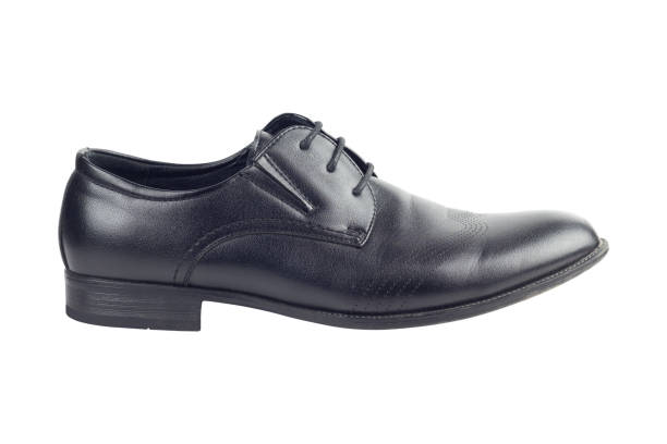 istock one black leather shoe isolated from the background 1651146706