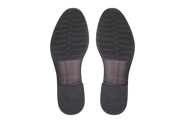 istock footprints, sole of shoes, bottom view, isolated from background 1651147228