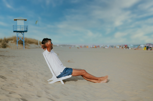 Man Enjoys On A Beach