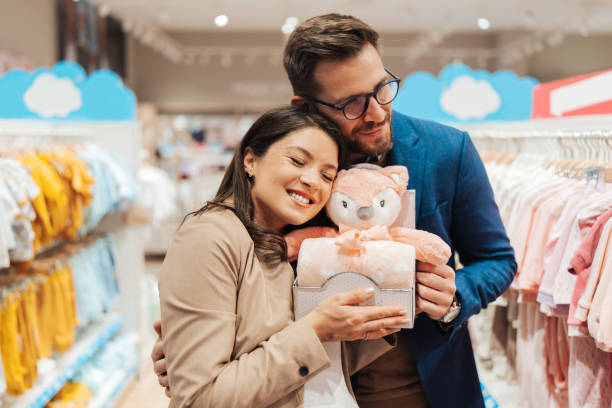 istock Young couple in baby shop 1651177853