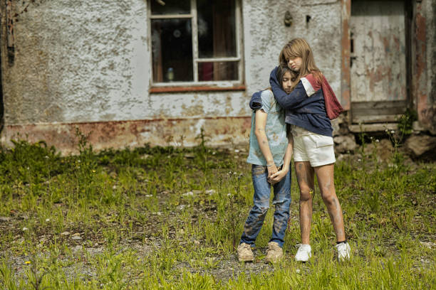 Little brother hugging his sister