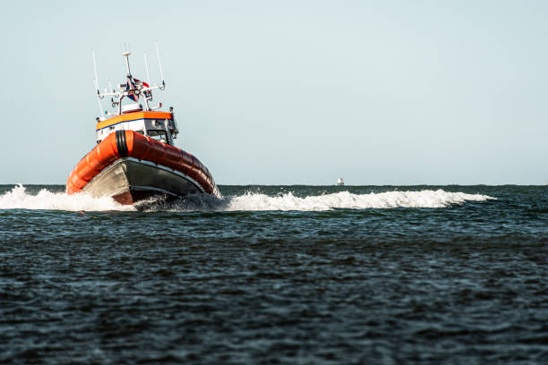 a pilot boat sails from the western scheldt sea into the port of Terneuzen at the dutch coast in zeeland