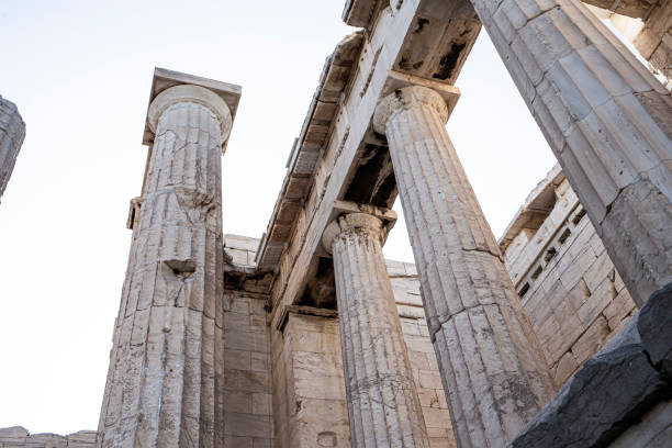 istock Many marble columns in a row in ancient restored Parthenon Acropolis in Athens, Greece 1651254461