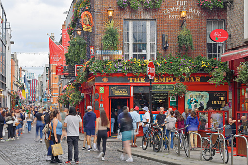 Dublin, Ireland - August 13, 2023: visitors walking around in the Temple Bar district.