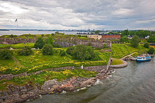 Suomenlinna Fortress Island Helsinki Finland Europe Old star-shape fortress Suomenlinna in front of Helsinki, Finland, North Europe. Seagulls flying nearby. Image taken from cruise ship. fort photos stock pictures, royalty-free photos & images