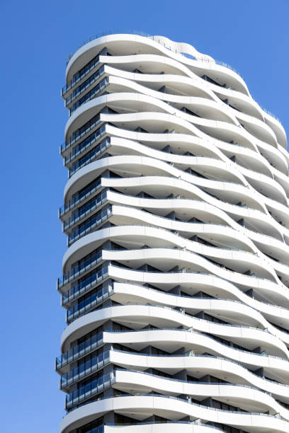 istock Modern apartment building, blue sky background with copy space 1651273792