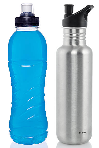 A vibrant red water bottle resting among rocks in a peaceful mountain stream, surrounded by flowing water and serene nature. Perfect for depicting outdoor adventures, hydration, travel, or eco-friendly themes as well as sustainable life and resources