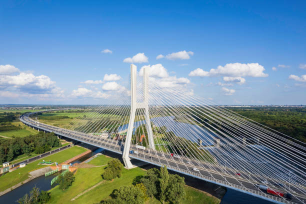 istock suspension bridge over the river (aerial) 1651312675