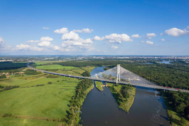 istock suspension bridge over the river (aerial) 1651312680