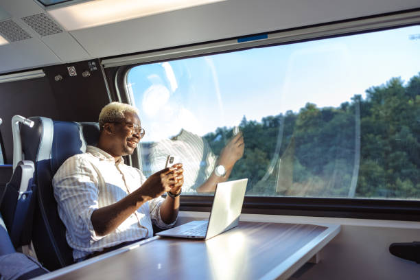 istock African American businessman using wireless technology in train 1651312872