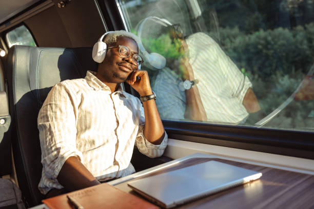 istock African American male commuter sleeping in train 1651313154