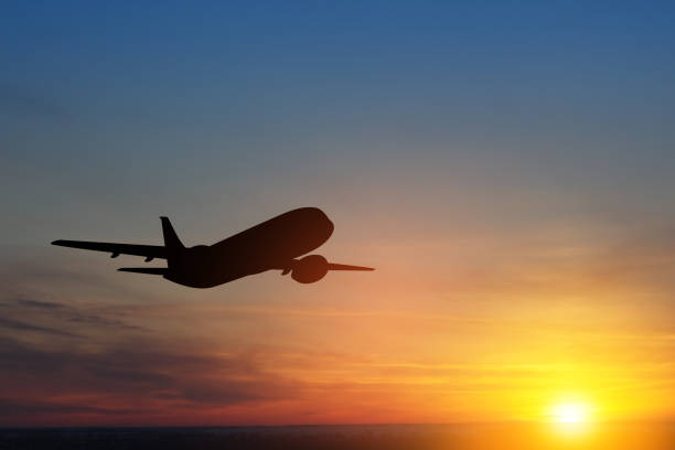 istock Airplane taking off at the sunset sky. 1651332560