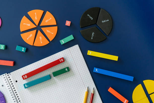 istock Colorful math feactions, numbers on blue background.  Interesting fun, creative mathematics for kids. Education,  back to school concept. Mathematical backdrop 1651415712