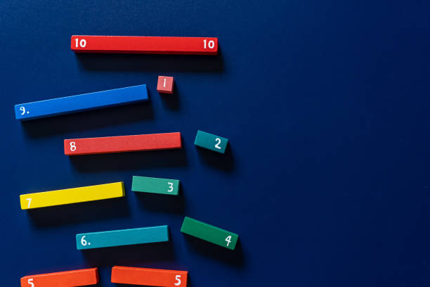 istock Colorful math feactions, numbers on blue background.  Interesting fun, creative mathematics for kids. Education,  back to school concept. Mathematical backdrop 1651417906
