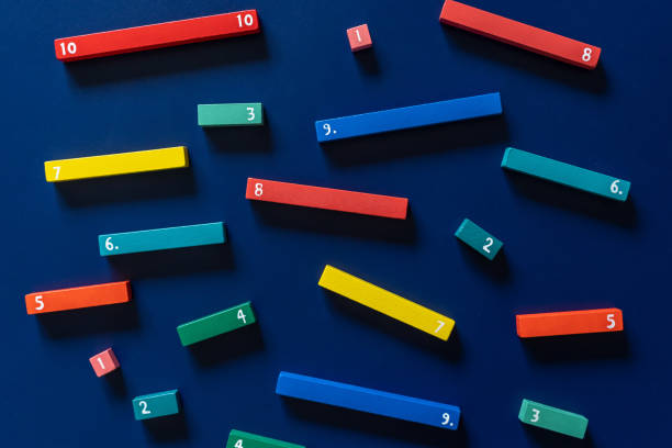 istock Colorful math feactions, numbers on blue background.  Interesting fun, creative mathematics for kids. Education,  back to school concept. Mathematical backdrop 1651418457