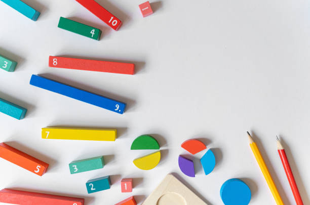 istock Colorful math feactions, numbers on white background.  Interesting fun, creative mathematics for kids. Education,  back to school concept. Mathematical backdrop 1651421714