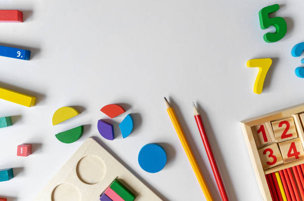 istock Colorful math feactions, numbers on white background.  Interesting fun, creative mathematics for kids. Education,  back to school concept. Mathematical backdrop 1651422772