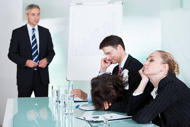 istock Bored businesswoman sleeping in a meeting 165144986