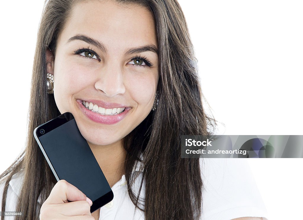 Młoda kobieta trzyma smartphone - Zbiór zdjęć royalty-free (Aspiracje)