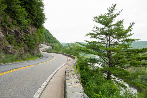 istock Port Jervis NY road along Delaware River 1651489115