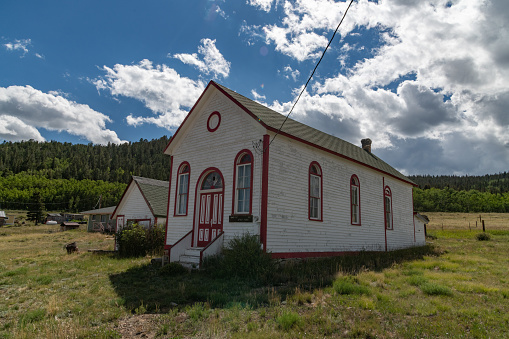Old rural Catholic church building from the 1880s in Colorado, in western USA, of North America