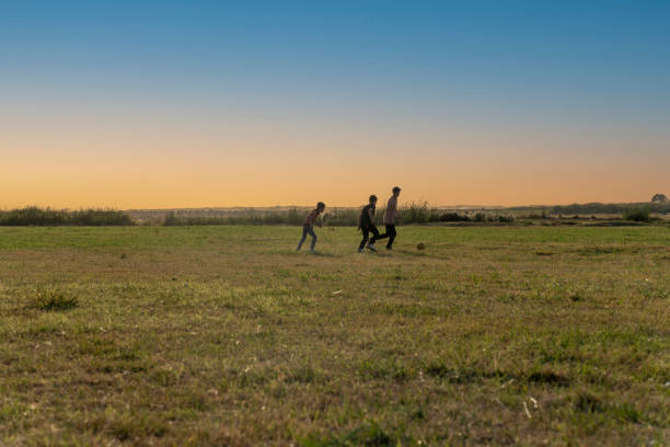 istock Children playing soccer in nature. 1651597406
