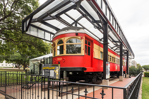 Plano, Texas, USA - October 27th, 2021: Historical exhibit, railroad car in the Haggard Park in the city center