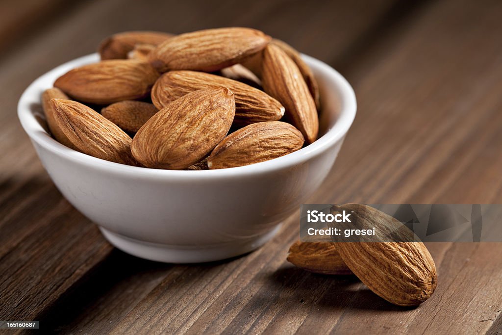 almonds almonds isolated on the white background Almond Stock Photo