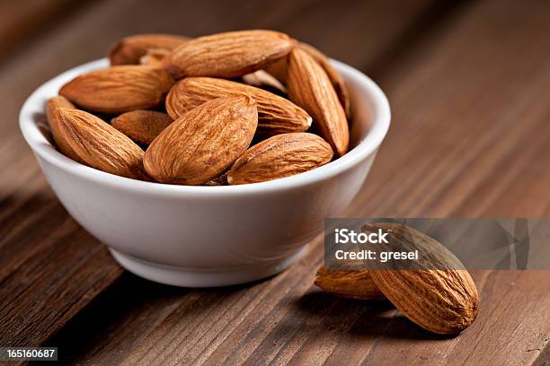 Almonds Stock Photo - Download Image Now - Almond, Brown, Close-up