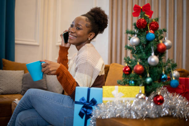 istock Happy woman celebrating Christmas 1651618585