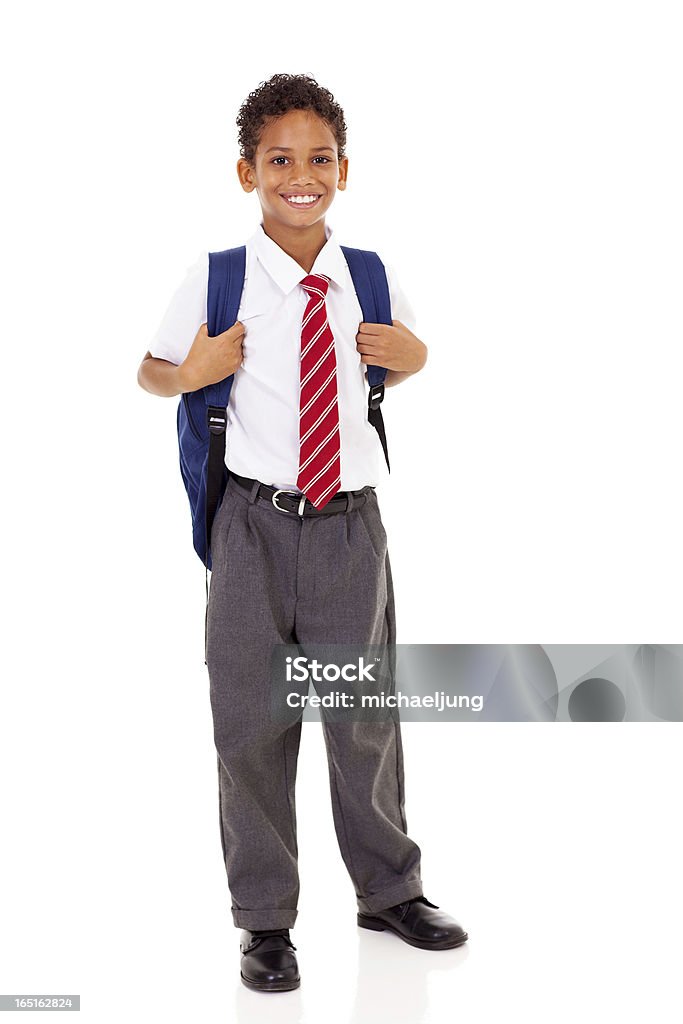 male elementary school student with backpack male elementary school student with backpack isolated on white School Uniform Stock Photo